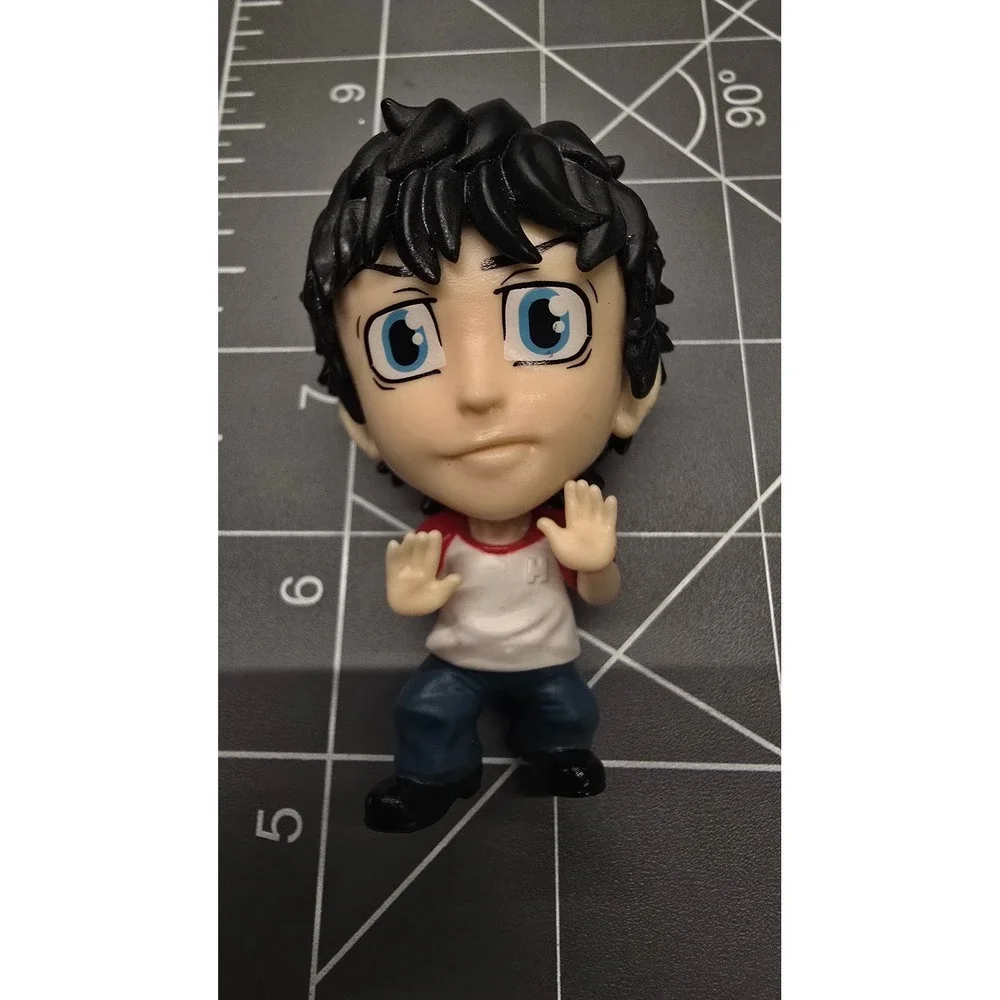 Mini-figure of Takemichi Hanagaki from the popular anime series Tokyo Revengers